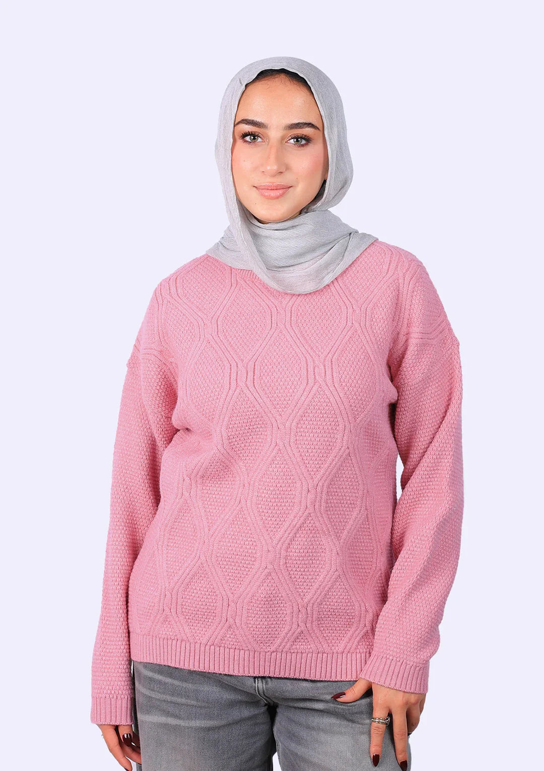 Woman in a light grey hijab and pink textured sweater from WIND Shopping
