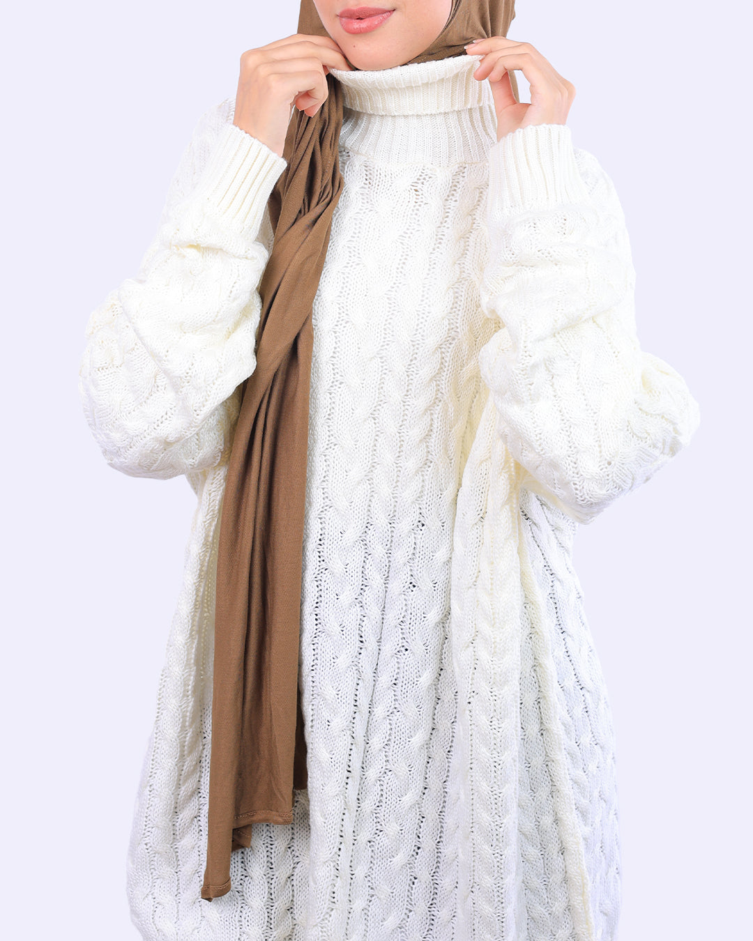 Woman wearing a white cable knit turtleneck sweater and brown hijab, WIND Shopping fashion