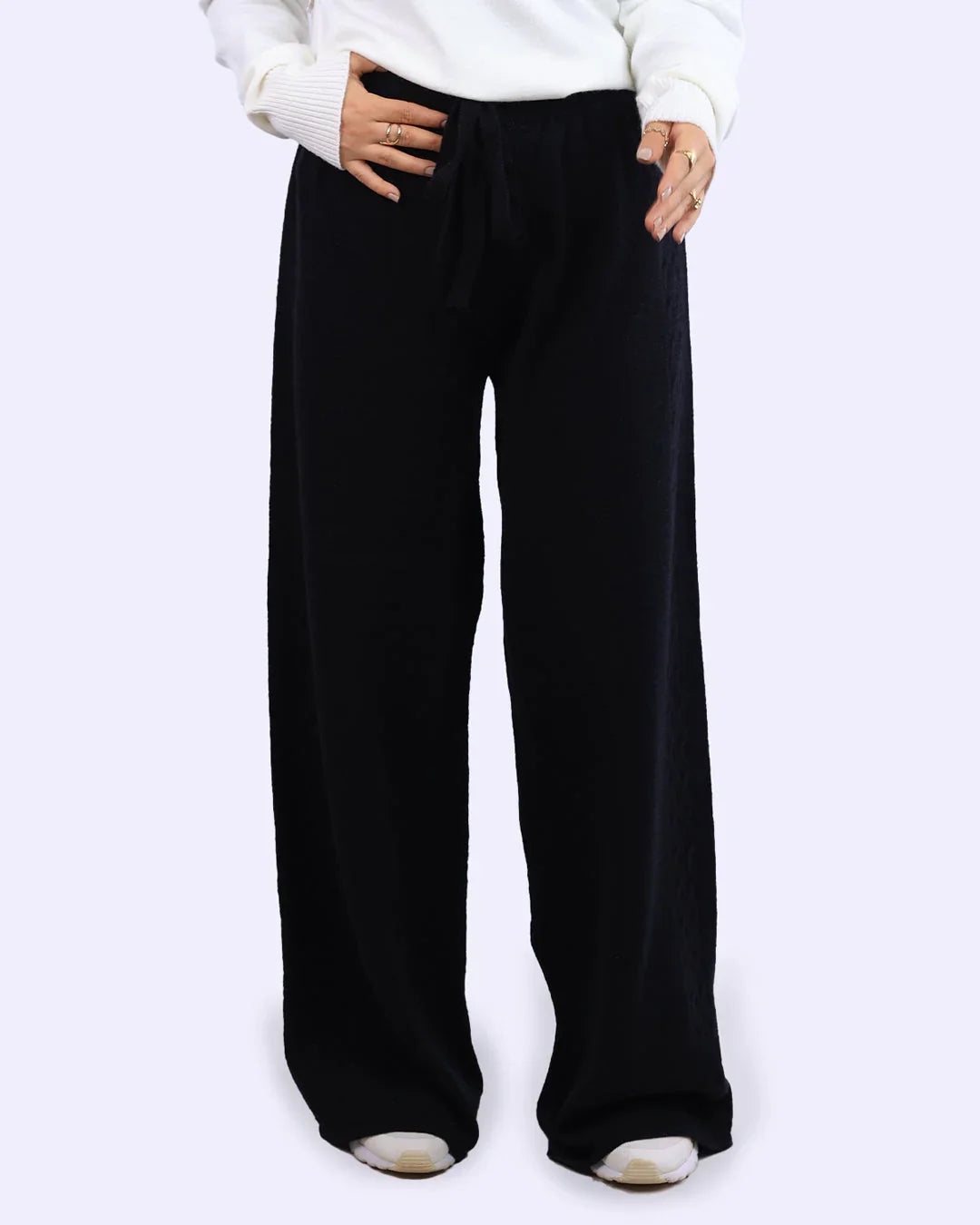 Wide leg black pants with drawstring, styled with white sweater from WIND Shopping Egypt fashion