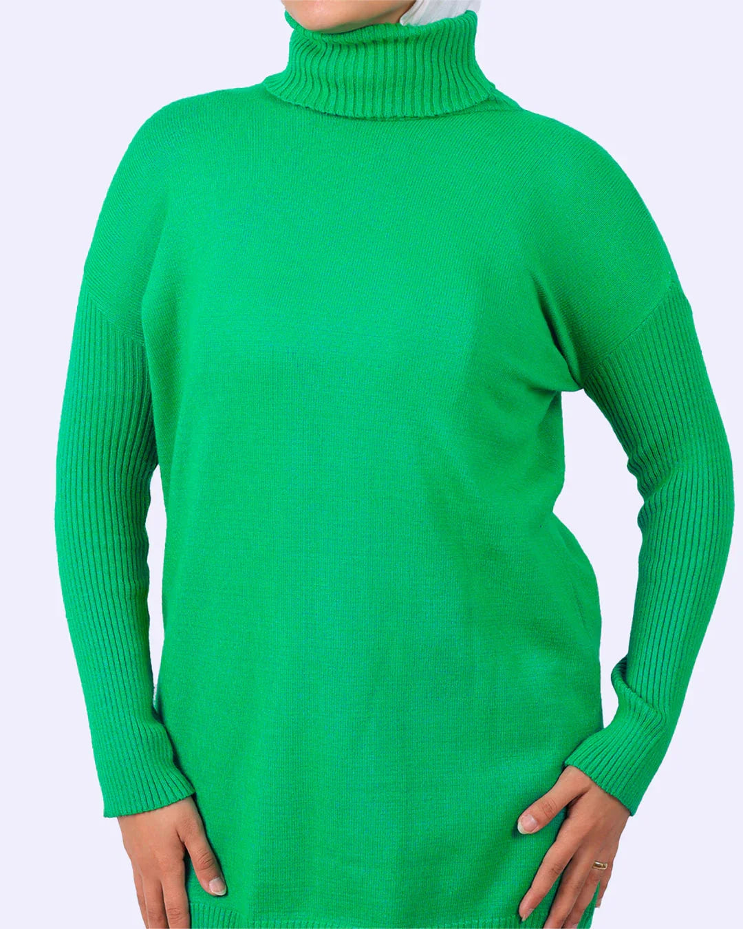Woman wearing bright green turtleneck sweater from WIND Shopping fashion collection