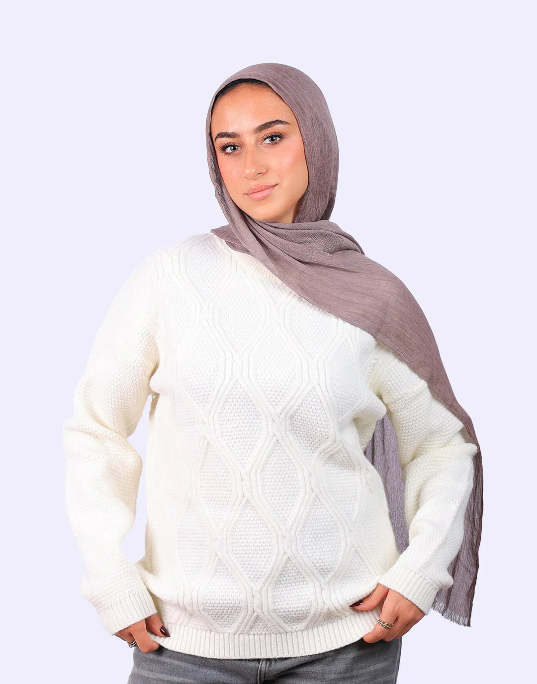 Woman wearing a white knit sweater and mauve hijab, WIND Shopping fashion Egypt