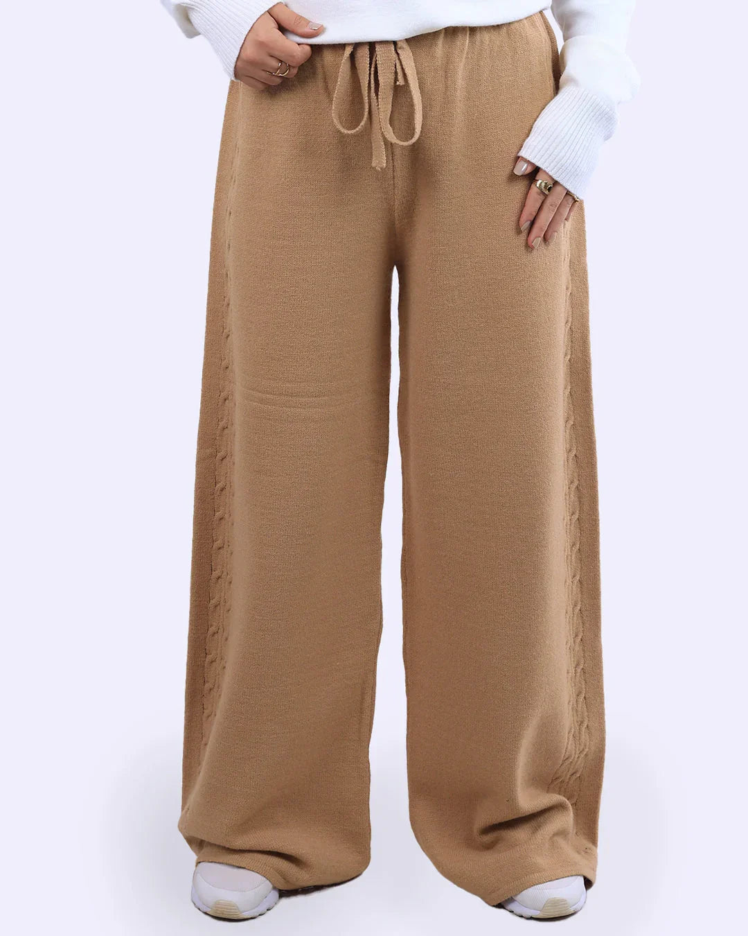 Wide-leg beige knit pants with drawstring waist from WIND Shopping, styled with a white sweater