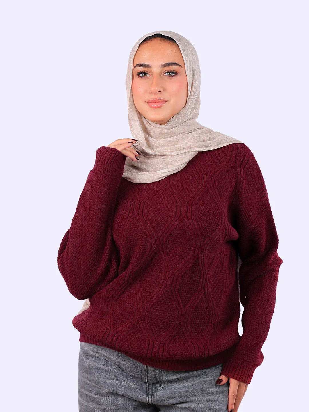 Woman in beige hijab and maroon knit sweater from WIND Shopping, stylish winter fashion Egypt