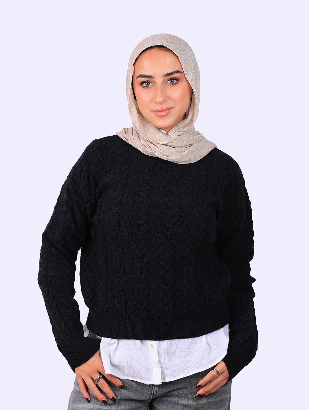 Woman in beige hijab and black cable knit sweater, WIND Shopping fashion collection
