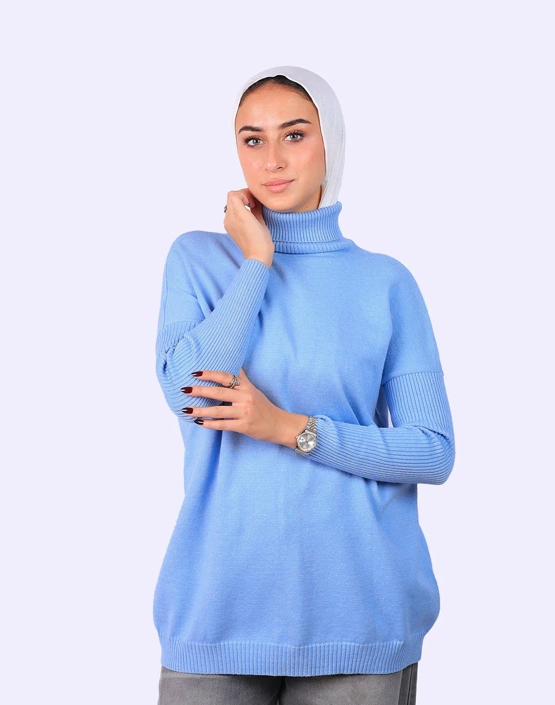Woman wearing light blue turtleneck sweater and white hijab, WIND Shopping fashion Egypt