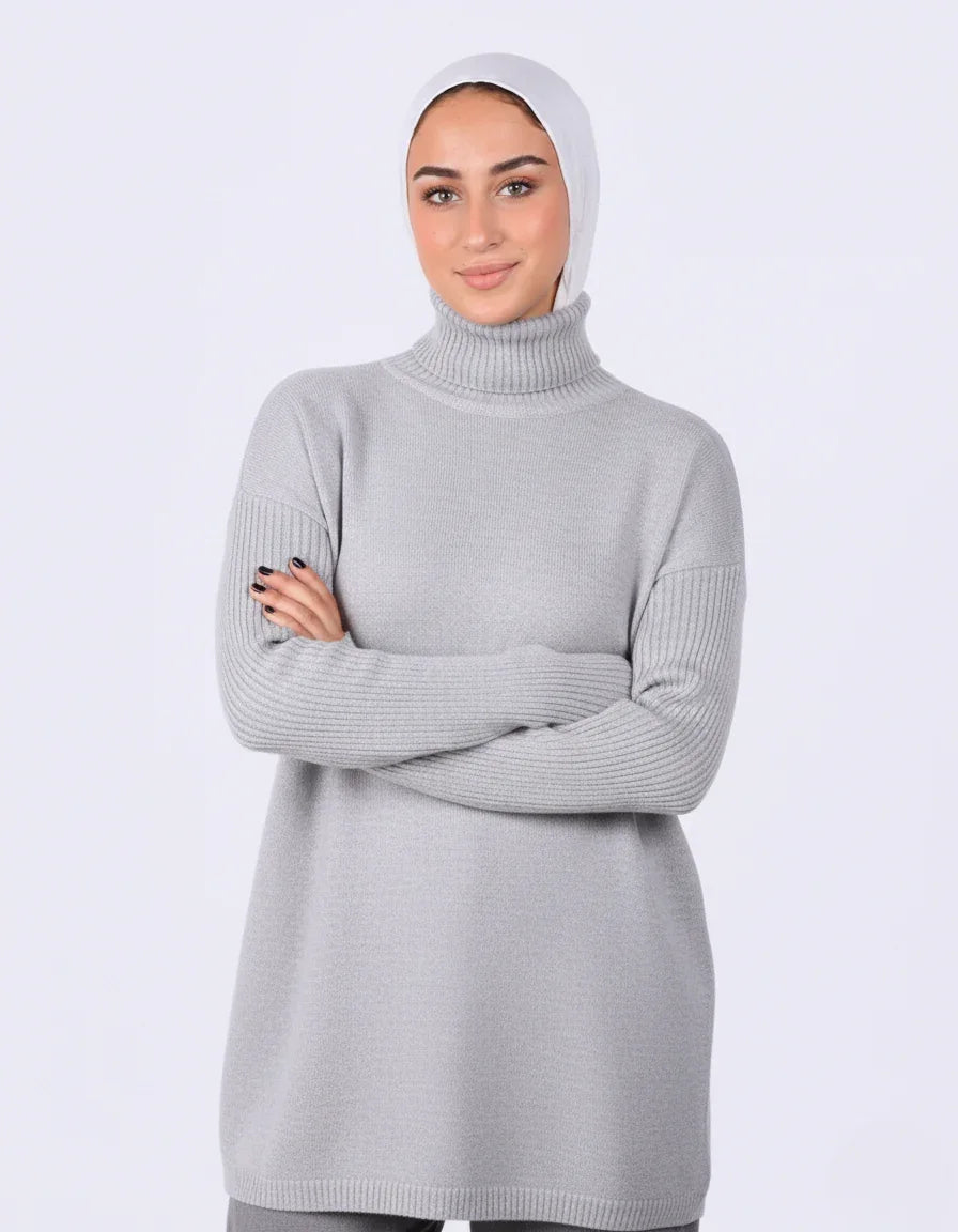 Woman in light grey turtleneck sweater and white hijab, WIND Shopping Egypt fashion