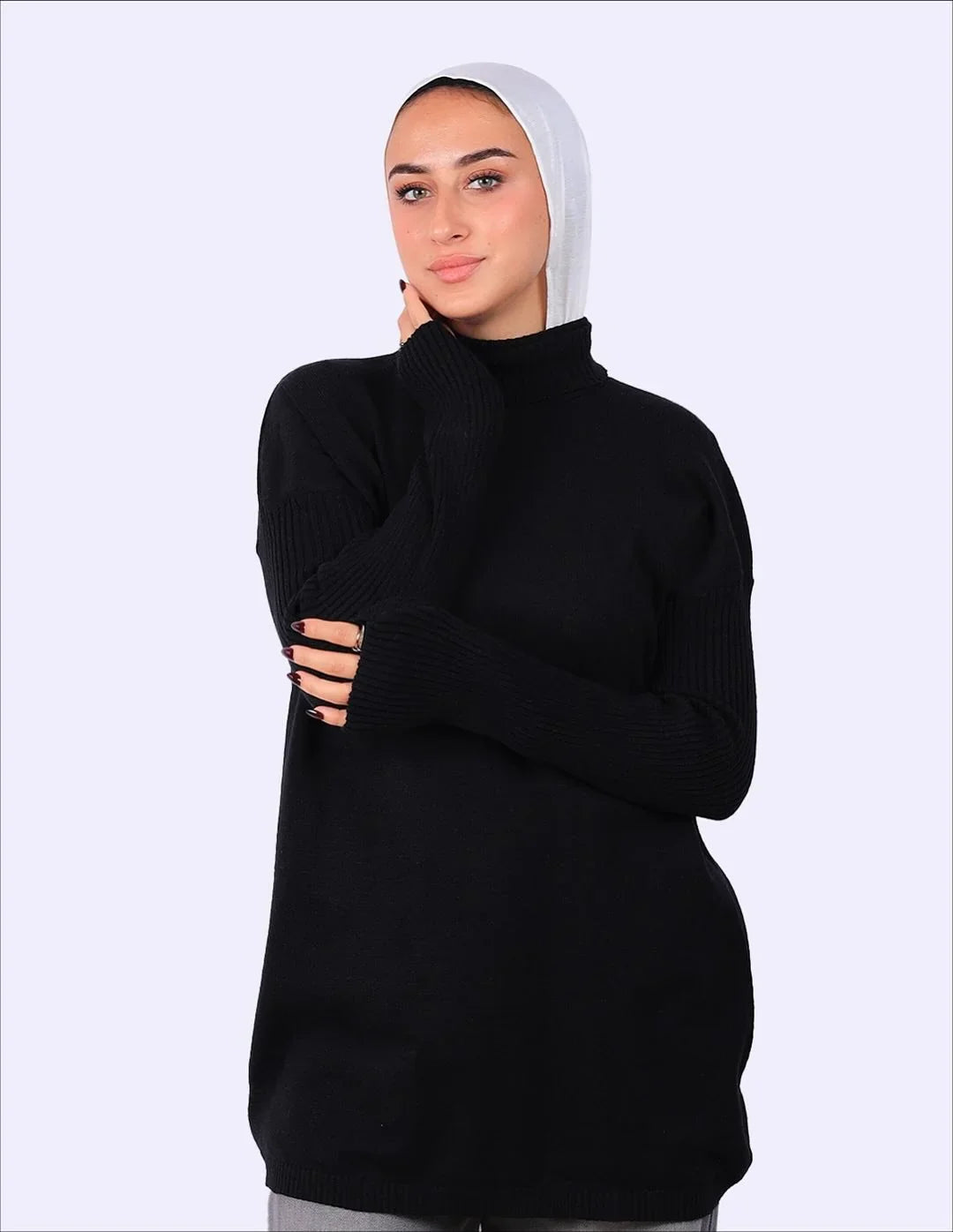 Woman wearing black knit turtleneck sweater and white hijab, WIND Shopping fashion style