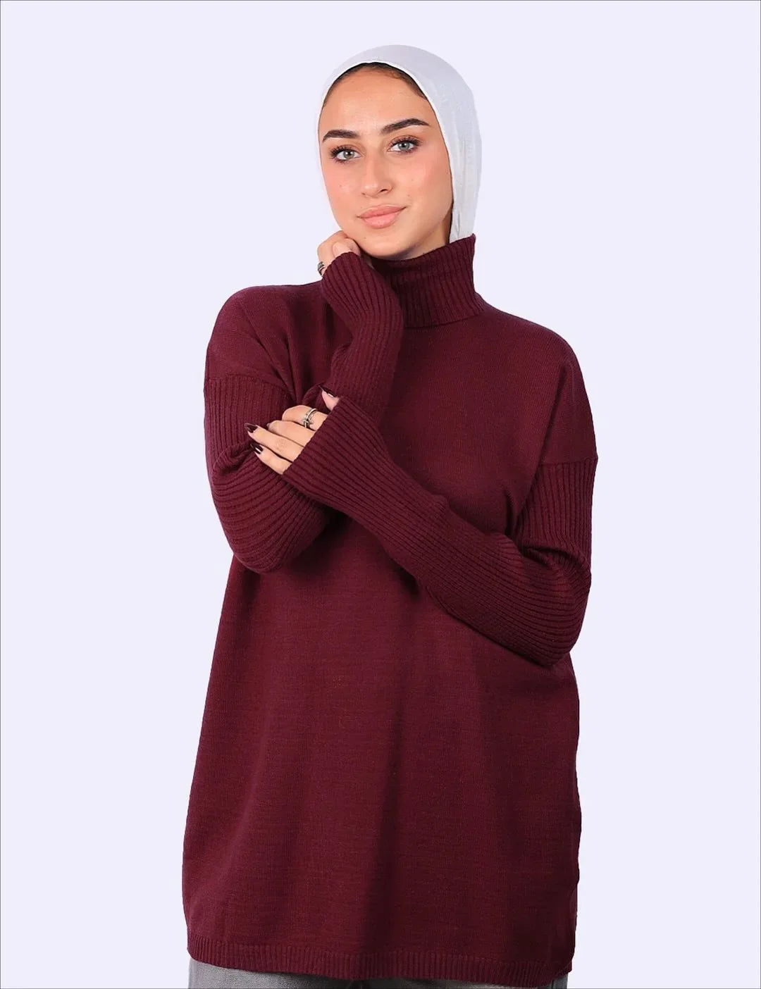 Woman in burgundy turtleneck sweater and white hijab, WIND Shopping Egypt fashion