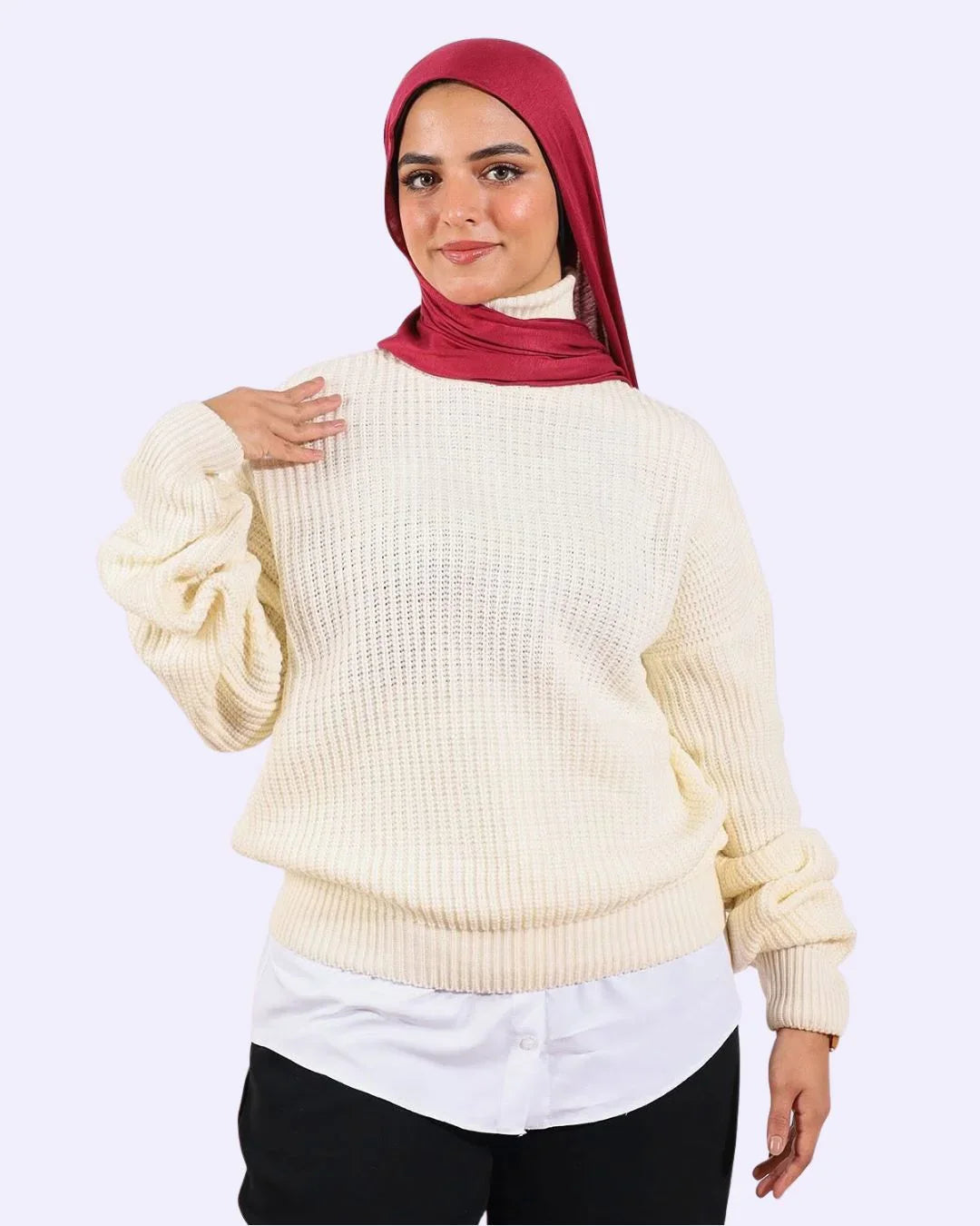Woman in cream knit sweater and red hijab from WIND Shopping fashion collection