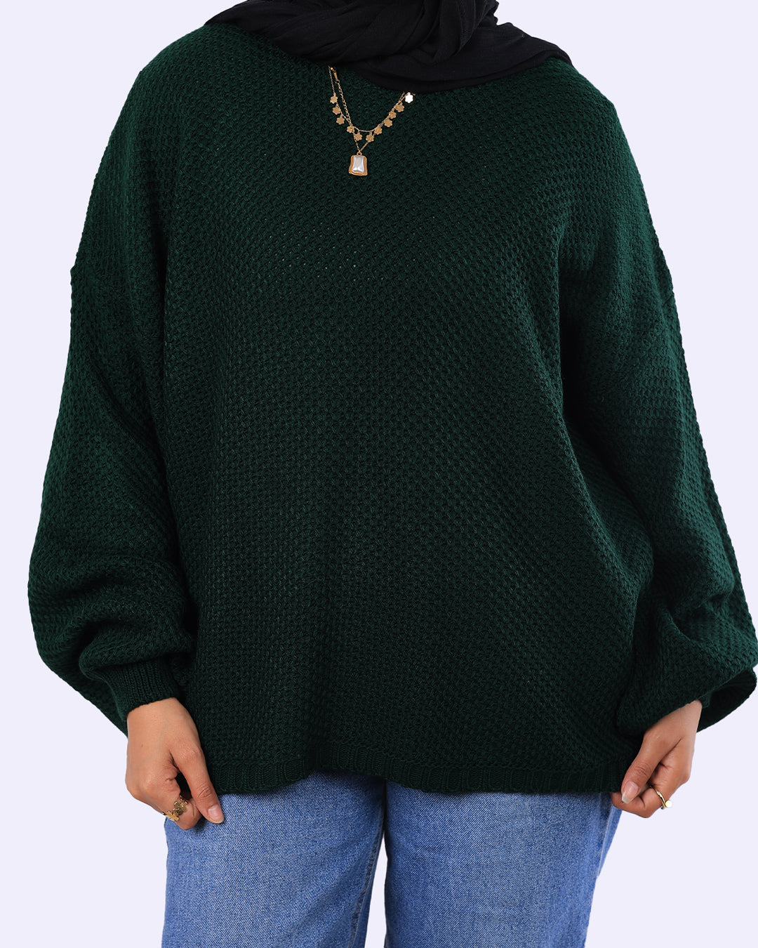 "بلوفر Cloud تريكو أوفر سايز من Wind بلون أوليف عصري، يتميز بخامة Knitted مرنة وقصة منسدلة تبرز جمال التصميم المحتشم - ويند"